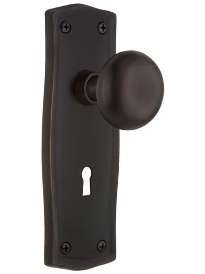 Prairie Design Mortise Lock Set With Round Brass Knobs in Timeless Bronze.